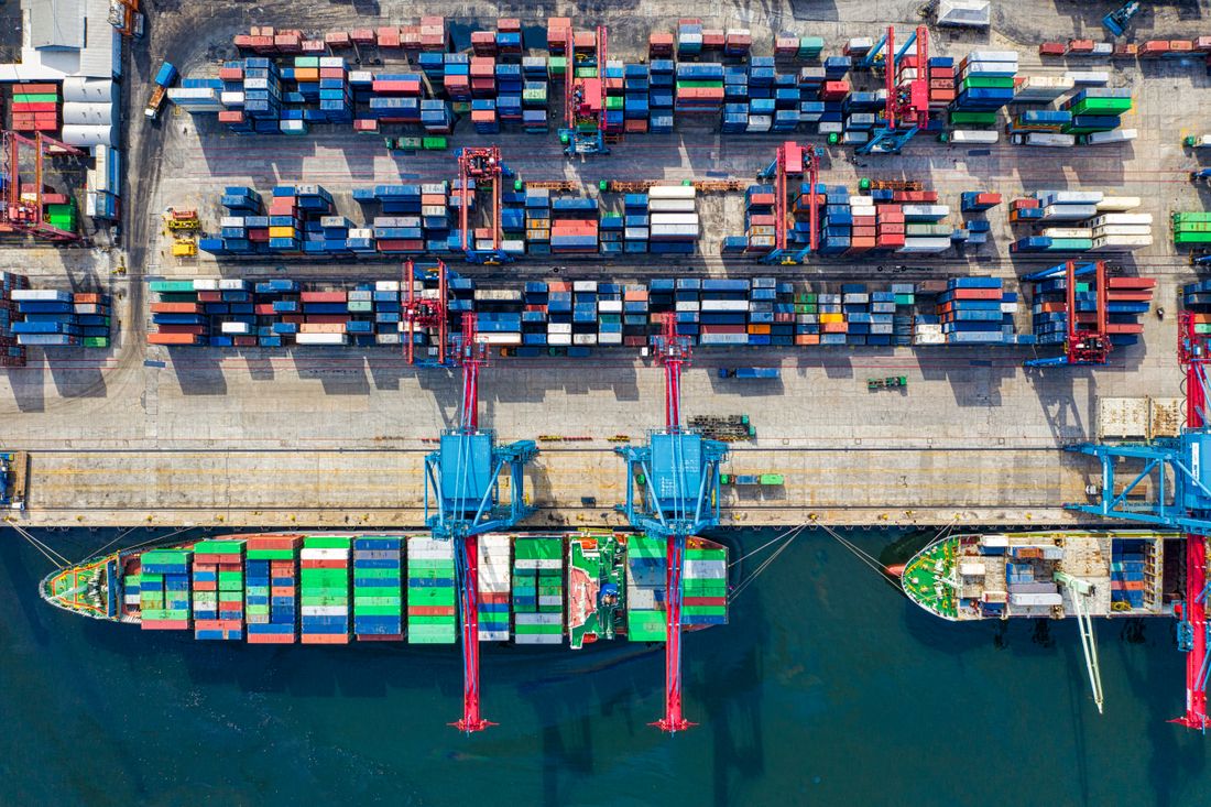 Stacked shipping containers at a port terminal