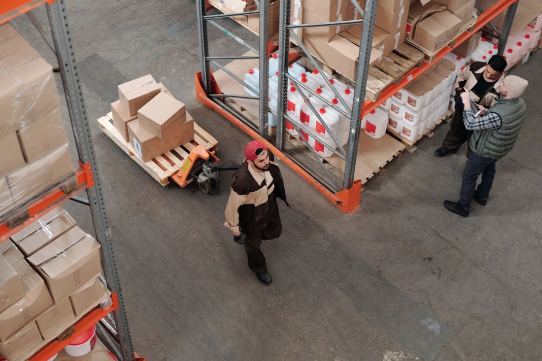 Customs broker reviewing import documentation on a clipboard