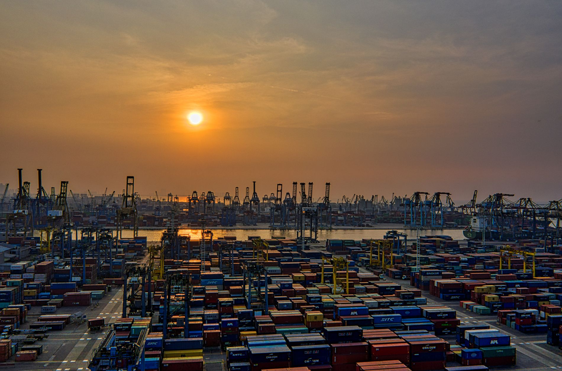 Aerial view of a container terminal at sunset